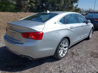2014 Chevrolet Impala LTZ with VIN 1G1155S33EU159517, listed as a IAAI auction lot 41991045 with 222,294 mi miles and . Bid and sale history available at DreamBid. Image 4.