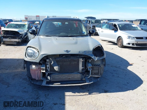 2019 MINI Countryman Cooper S z VIN WMZYT5C54K3G94548, wystawiony jako IAAI lot #42210212 z przebiegiem 82 505 mil mil oraz . Historia ofert i sprzedaży dostępna na DreamBid. Obrazek 12.