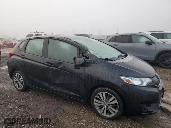 2015 Honda Fit EX-L with VIN 3HGGK5H82FM703509, listed as a Copart auction lot 86336004 with 155,193 mi miles and Salvage Title. Bid and sale history available at DreamBid. Image 4.