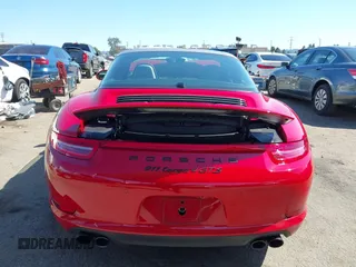 2016 Porsche 911 4S z VIN WP0BB2A99GS136573, wystawiony jako IAAI lot #42238845 z przebiegiem 13 464 mil mil oraz . Historia ofert i sprzedaży dostępna na DreamBid. Obrazek 16.
