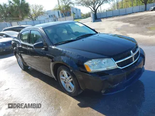2010 Dodge Avenger R/T with VIN 1B3CC5FB7AN114240, listed as a IAAI auction lot 41694017 with 210,609 mi miles. Bid and sale history available at carsss.com. Image 1.