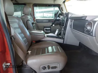 2003 Hummer H2 with VIN 5GRGN23U13H128617, listed as a IAAI auction lot 41494349 with 135,295 mi miles. Bid and sale history available at carsss.com. Image 5.