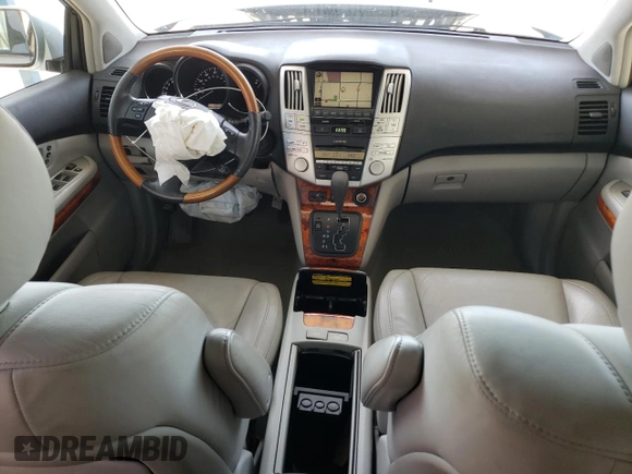 2009 Lexus RX 350 with VIN 2T2HK31U69C122392, listed as a Copart auction lot 52439995 with 185,463 mi miles and Salvage Title. Bid and sale history available at DreamBid. Image 8.