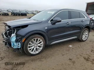 2022 Cadillac XT4 AWD Premium Luxury with VIN 1GYFZDR42NF147920, listed as a Copart auction lot 84058554 with 12,145 mi miles and Salvage Title. Bid and sale history available at carsss.com. Image 1.
