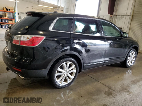 2011 Mazda CX-9 Grand Touring z VIN JM3TB3DV5B0303929, wystawiony jako Copart lot #59821825 z przebiegiem 149 663 mil mil oraz Szkoda całkowita • Salvage title. Historia ofert i sprzedaży dostępna na DreamBid. Obrazek 3.