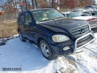 2003 Mercedes-Benz M-Class 3.7L with VIN 4JGAB57E33A421704, listed as a IAAI auction lot 41404597 with 192,078 mi miles. Bid and sale history available at carsss.com. Image 1.