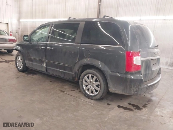 2011 Chrysler Town & Country Touring-L with VIN 2A4RR8DG5BR799358, listed as a IAAI auction lot 41650275 with 143,779 mi miles. Bid and sale history available at carsss.com. Image 3.