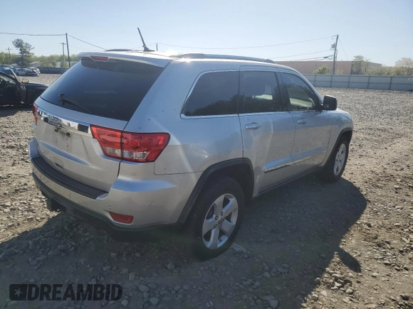 2011 Jeep Grand Cherokee Laredo with VIN 1J4RR4GG1BC714058, listed as a Copart auction lot 54974435 with 201,329 mi miles and Clean Title. Bid and sale history available at carsss.com. Image 3.