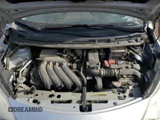 2014 Nissan Note SV with VIN 3N1CE2CP7EL406986, listed as a Copart auction lot 52984175 with 128,727 mi miles and Salvage Title. Bid and sale history available at DreamBid. Image 11.