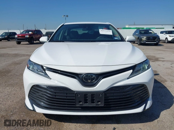 2019 Toyota Camry LE with VIN 4T1B11HK9KU825107, listed as a IAAI auction lot 41971159 with 15,802 mi miles and . Bid and sale history available at DreamBid. Image 12.
