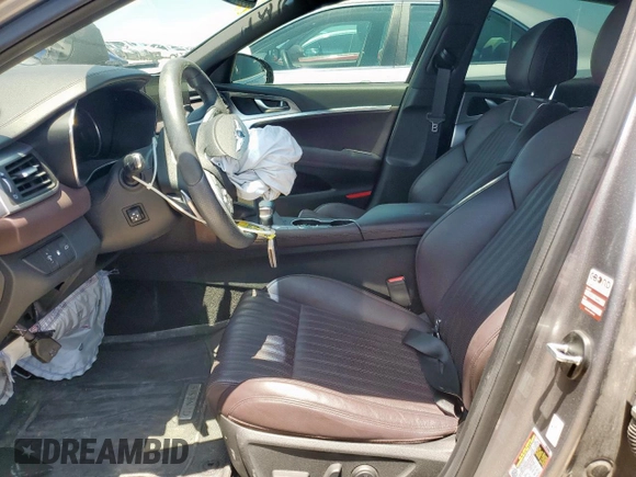 2022 Genesis G70 2.0T z VIN KMTG34TA3NU091204, wystawiony jako Copart lot #57073325 z przebiegiem 62 529 mil mil oraz Szkoda całkowita • Salvage title. Historia ofert i sprzedaży dostępna na DreamBid. Obrazek 7.