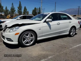 2012 Mercedes-Benz E 350 Luxury with VIN WDDHF5KBXCA588524, listed as a Copart auction lot 62986955 with 173,467 mi miles and Salvage title. Bid and sale history available at DreamBid. Image 1.
