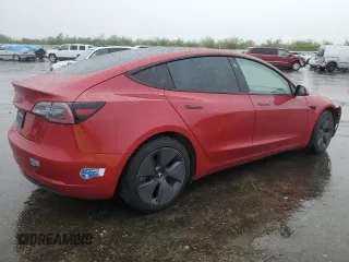 2021 Tesla Model 3 Standard Range Plus with VIN 5YJ3E1EA9MF870214, listed as a Copart auction lot 47702535 with 46,486 mi miles and Salvage Title. Bid and sale history available at DreamBid. Image 3.
