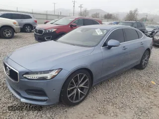 2018 Volvo S90 Momentum z VIN LVY102MK9JP047122, wystawiony jako Copart lot #50156215 z przebiegiem 90 449 mil mil oraz Szkoda całkowita • Salvage title. Historia ofert i sprzedaży dostępna na DreamBid. Obrazek 1.