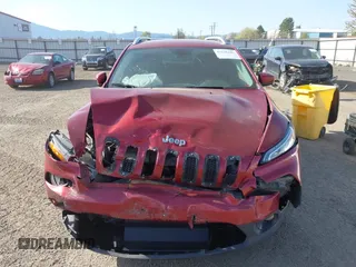 2016 Jeep Cherokee Latitude with VIN 1C4PJMCS8GW250318, listed as a IAAI auction lot 42126241 with 105,028 mi miles. Bid and sale history available at carsss.com. Image 13.