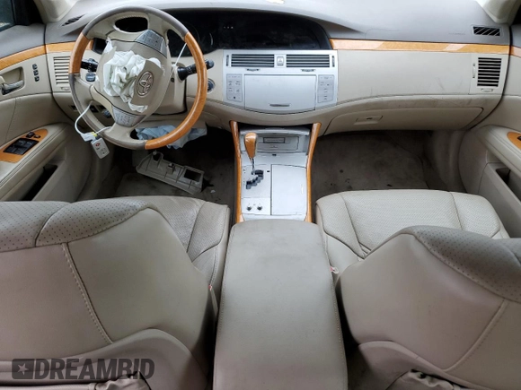 2007 Toyota Avalon XL z VIN 4T1BK36B97U189386, wystawiony jako Copart lot #55917365 z przebiegiem Nie podano mil oraz Szkoda całkowita • Salvage title. Historia ofert i sprzedaży dostępna na DreamBid. Obrazek 8.