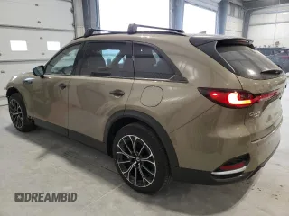 2025 Mazda CX-70 Premium z VIN JM3KJDHA9S1100080, wystawiony jako Copart lot #83074444 z przebiegiem 2861 mil mil oraz Tytuł czysty. Historia ofert i sprzedaży dostępna na DreamBid. Obrazek 2.