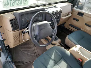 2000 Jeep Wrangler Sahara with VIN 1J4FA59S6YP739265, listed as a Copart auction lot 87437674 with 208,638 mi miles and Clean title. Bid and sale history available at DreamBid. Image 8.