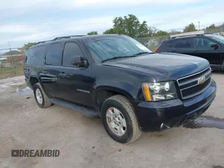 2010 Chevrolet Suburban LS with VIN 1GNUKHE38AR190423, listed as a IAAI auction lot 41655080 with 215,187 mi miles. Bid and sale history available at carsss.com. Image 1.