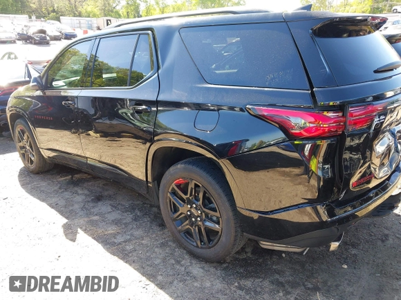 2023 Chevrolet Traverse Premier with VIN 1GNERKKW5PJ128805, listed as a IAAI auction lot 42032622 with 36,463 mi miles and . Bid and sale history available at DreamBid. Image 3.