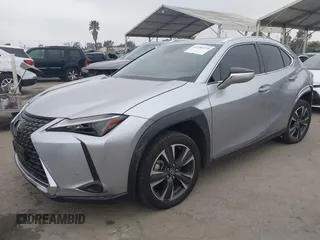 2023 Lexus UX 250h with VIN JTHX6JBH6P2143926, listed as a IAAI auction lot 42180779 with 65,106 mi miles and . Bid and sale history available at DreamBid. Image 2.