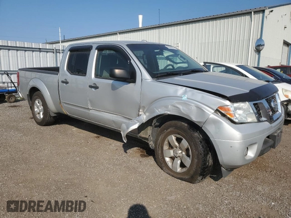 2013 Nissan Frontier SV with VIN 1N6AD0FVXDN715000, listed as a Copart auction lot 69560064 with 238,973 mi miles and Clean title. Bid and sale history available at DreamBid. Image 4.