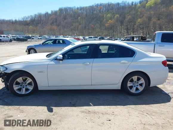 2015 BMW 5 Series 528i xDrive with VIN WBA5A7C54FG143565, listed as a IAAI auction lot 41948957 with 107,255 mi miles and . Bid and sale history available at carsss.com. Image 14.