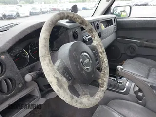 2007 Jeep Commander Sport с VIN 1J8HG48P97C599005, выставлен на аукционе IAAI как лот 42269399 с пробегом Не указан миль и . История ставок и продаж доступна на DreamBid. Изображение 6.