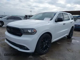 2015 Dodge Durango SXT with VIN 1C4RDHAG0FC793443, listed as a IAAI auction lot 41376184 with 113,123 mi miles and . Bid and sale history available at DreamBid. Image 2.