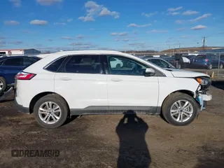 2019 Ford Edge SEL z VIN 2FMPK4J94KBB99418, wystawiony jako IAAI lot #41294393 z przebiegiem 57 706 mil mil oraz . Historia ofert i sprzedaży dostępna na DreamBid. Obrazek 13.