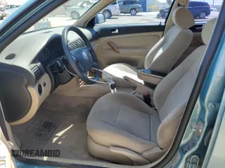 1999 Volkswagen Passat GL z VIN WVWMD63BXXE058992, wystawiony jako Copart lot #57342545 z przebiegiem 89 523 mil mil oraz Szkoda całkowita • Salvage title. Historia ofert i sprzedaży dostępna na DreamBid. Obrazek 7.