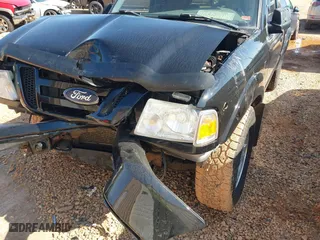 2011 Ford Ranger XLT with VIN 1FTLR4FE5BPA16802, listed as a IAAI auction lot 40502397 with 125,278 mi miles. Bid and sale history available at carsss.com. Image 6.