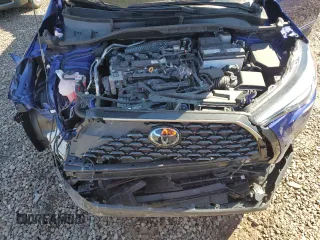 2022 Toyota Corolla Cross XLE with VIN 7MUDAABG3NV006450, listed as a Copart auction lot 53240735 with 19,976 mi miles and Salvage title. Bid and sale history available at DreamBid. Image 12.