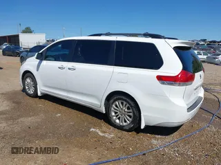 2014 Toyota Sienna XLE z VIN 5TDYK3DC7ES431782, wystawiony jako IAAI lot #41975182 z przebiegiem 191 870 mil mil oraz . Historia ofert i sprzedaży dostępna na DreamBid. Obrazek 3.