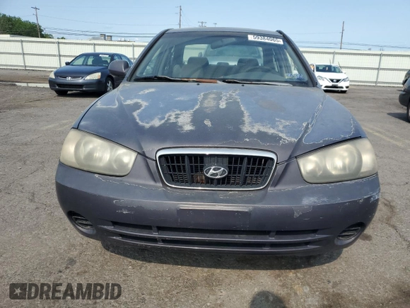 2002 Hyundai Elantra GLS with VIN KMHDN45D22U384067, listed as a Copart auction lot 59384065 with 131,236 mi miles and Salvage title. Bid and sale history available at DreamBid. Image 5.
