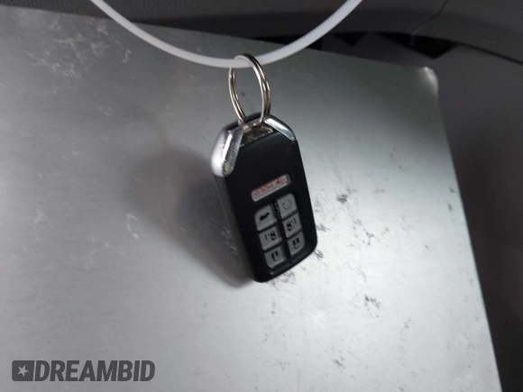 2018 Honda Odyssey Touring with VIN 5FNRL6H88JB062213, listed as a IAAI auction lot 42489379 with 90,578 mi miles and . Bid and sale history available at DreamBid. Image 11.