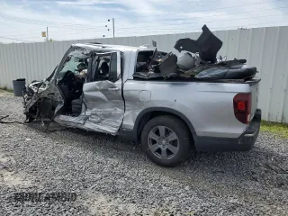 2020 Honda Ridgeline RTL-E с VIN 5FPYK3F70LB003853, выставлен на аукционе Copart как лот 56938085 с пробегом Не указан миль и Списание • Salvage title. История ставок и продаж доступна на DreamBid. Изображение 2.