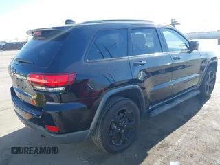 2018 Jeep Grand Cherokee Laredo E with VIN 1C4RJFAG4JC367924, listed as a IAAI auction lot 42065114 with 65,250 mi miles. Bid and sale history available at carsss.com. Image 4.