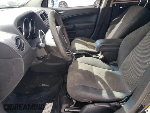 2011 Dodge Caliber Heat with VIN 1B3CB5HA3BD192562, listed as a Copart auction lot 48877855 with 133,588 mi miles and Salvage Title. Bid and sale history available at DreamBid. Image 7.