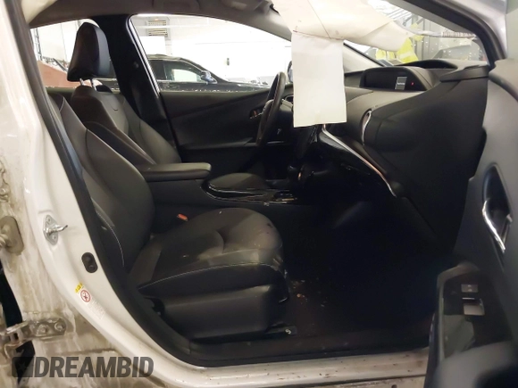 2022 Toyota Prius LE with VIN JTDKAMFP4N3223259, listed as a IAAI auction lot 41975054 with 49,558 mi miles and . Bid and sale history available at DreamBid. Image 5.