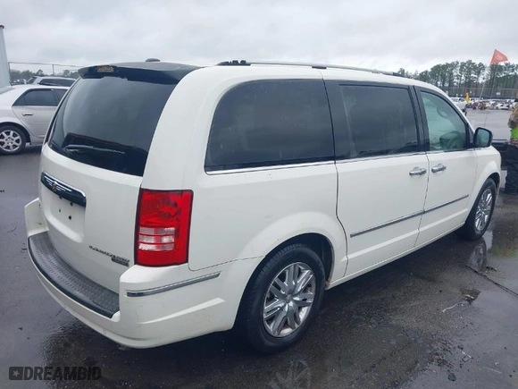 2010 Chrysler Town & Country Limited with VIN 2A4RR6DX1AR141930, listed as a IAAI auction lot 41557272 with NaN miles. Bid and sale history available at carsss.com. Image 4.