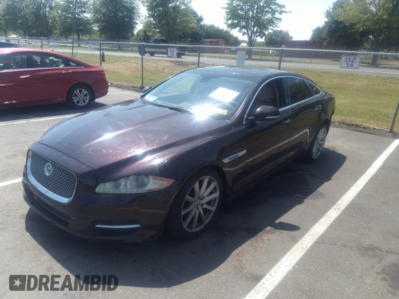 2011 Jaguar XJ with VIN SAJWA1CB5BLV09952, listed as a IAAI auction lot 41435624 with 114,892 mi miles and . Bid and sale history available at DreamBid. Image 2.