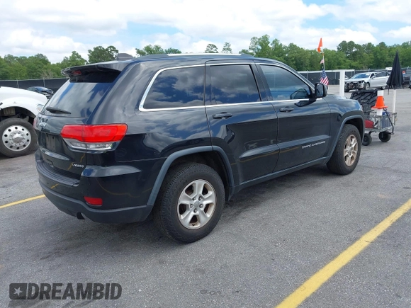 2016 Jeep Grand Cherokee Laredo with VIN 1C4RJEAG0GC320683, listed as a IAAI auction lot 42379025 with 124,750 mi miles and . Bid and sale history available at DreamBid. Image 4.