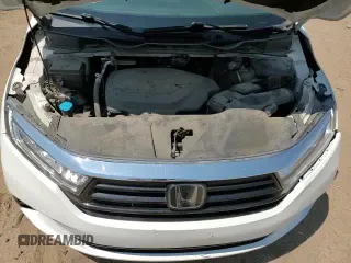 2021 Honda Odyssey EX-L с VIN 5FNRL6H73MB033715, выставлен на аукционе Copart как лот 68783355 с пробегом 78 574 миль миль и Списание • Salvage title. История ставок и продаж доступна на DreamBid. Изображение 16.