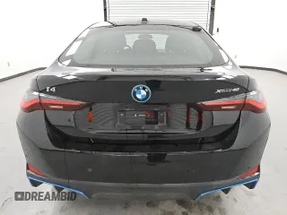 2024 BMW i4 xDrive40 z VIN WBY83FB05RFS78234, wystawiony jako Copart lot #53400425 z przebiegiem 20 731 mil mil oraz Tytuł czysty. Historia ofert i sprzedaży dostępna na DreamBid. Obrazek 6.