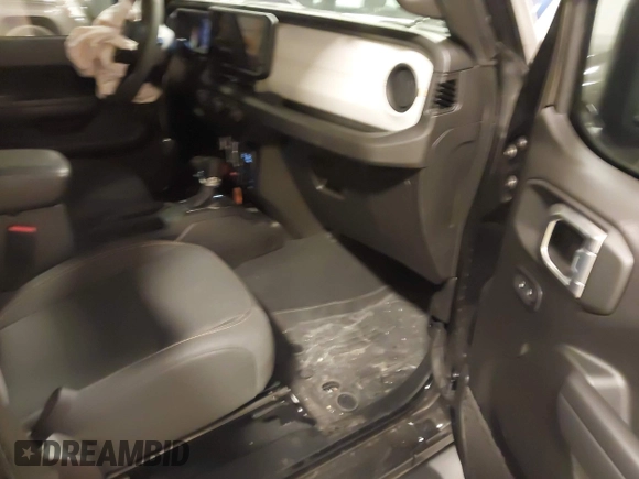 2024 Jeep Wrangler Sport S with VIN 1C4PJXDG4RW218996, listed as a IAAI auction lot 42088856 with 10,717 mi miles and . Bid and sale history available at DreamBid. Image 5.