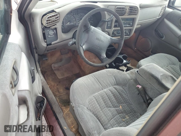 1998 Isuzu Hombre z VIN 1GGCS19X0W8650520, wystawiony jako Copart lot #73962444 z przebiegiem Nie podano mil oraz Szkoda całkowita • Salvage title. Historia ofert i sprzedaży dostępna na DreamBid. Obrazek 8.