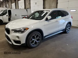 2017 BMW X1 xDrive28i with VIN WBXHT3C3XH5F85563, listed as a Copart auction lot 58713975 with 133,288 mi miles and Salvage title. Bid and sale history available at DreamBid. Image 1.