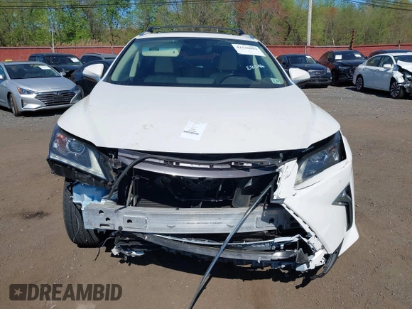2019 Lexus RX 350 with VIN JTJBZMCA0K2041419, listed as a IAAI auction lot 42128084 with 98,994 mi miles and . Bid and sale history available at DreamBid. Image 12.