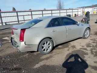 2009 Cadillac CTS AWD w/1SB with VIN 1G6DT57V990107958, listed as a IAAI auction lot 41685415 with 148,294 mi miles. Bid and sale history available at carsss.com. Image 4.
